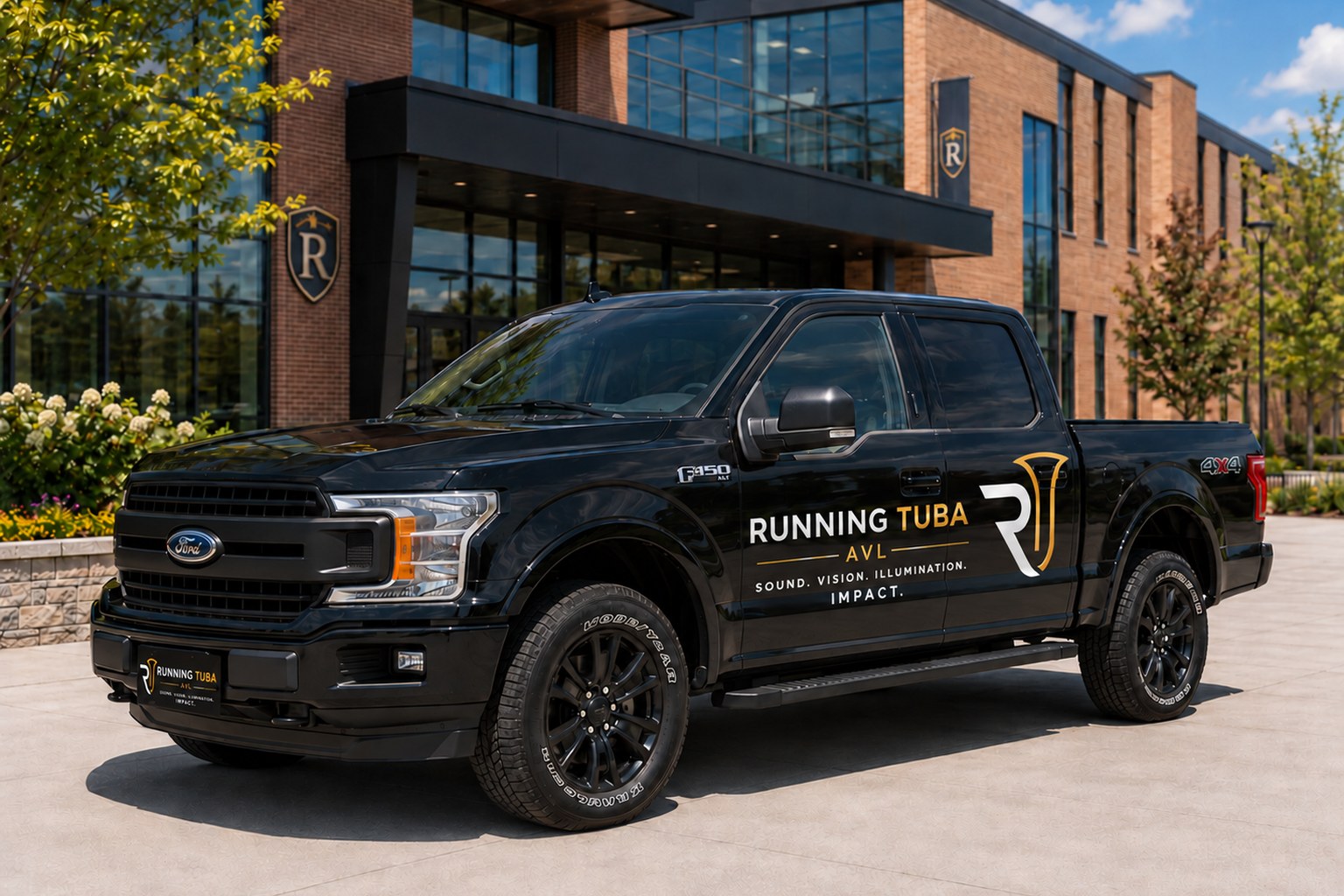 Branded Running Tuba AVL truck parked on site